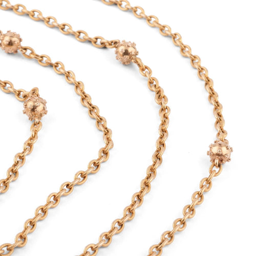Collier Sautoir ancien en or jaune orné de petites boules 58 Facettes 1