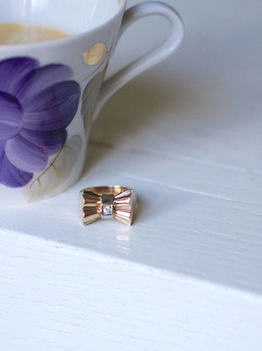 Bague Bague Tank Noeud or rose et diamants 58 Facettes