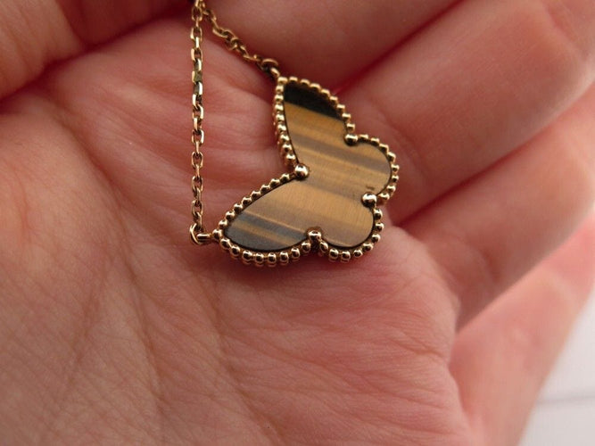 Collier collier van cleef &  arpels lucky alhambra or jaune oeil de tigre 58 Facettes 251004