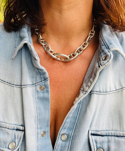 Collier Collier en argent de la maison Hermès 58 Facettes