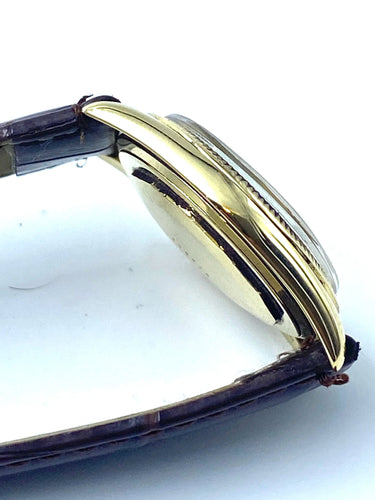 Montre BAUME ET MERCIER - Boitier Baumatic en or 58 Facettes