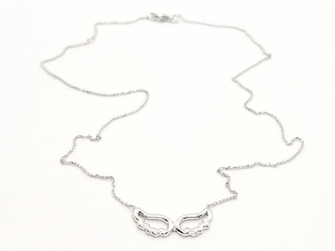 Collier Collier Aile d'ange Or blanc Diamant 58 Facettes 579302RV