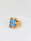 Bague Bague cocktail vintage en or et pierre bleue 58 Facettes 725