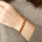 Bracelet Bracelet articulé arlequin Or jaune Email Corail 58 Facettes REF23101-123