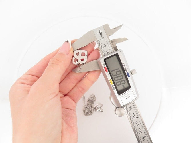 Collier collier POIRAY coeur entrelace mm chaine forcat or blanc 18k 58 Facettes 258177