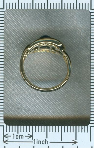 Bague 47 Bague Cartier, saphir cabochon & diamants 58 Facettes 17342-0256