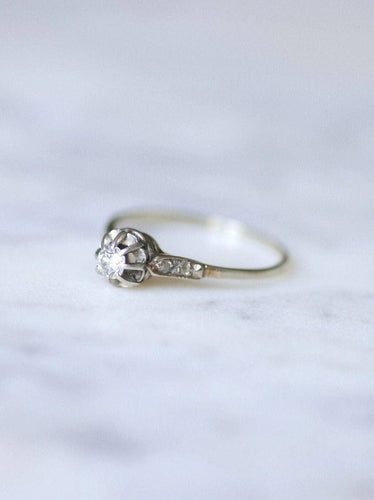 Bague solitaire Art Déco en or blanc, platine, et diamant 58 Facettes