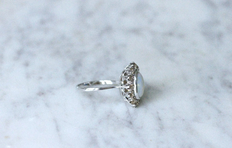 Bague Bague marguerite opale entourage diamants 58 Facettes