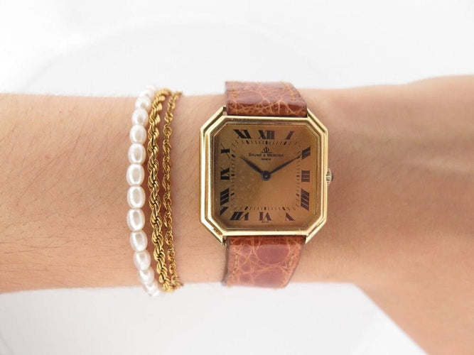 Montre vintage montre BAUME ET MERCIER 29 mm en or jaune 18k mecanique lady 58 Facettes 254182