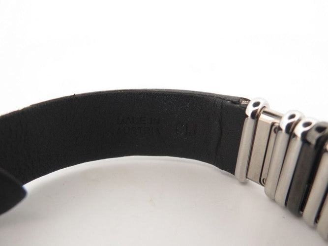 Montre vintage montre CARTIER declaration titane & acier 4 diamants 0.12ct quartz 58 Facettes 254101