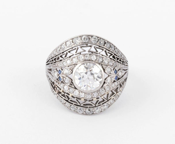 Bague Bague dôme ornée d'un diamant central 58 Facettes