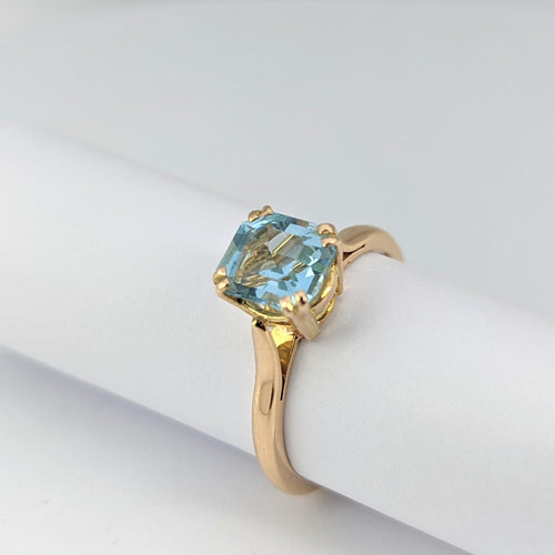 Bague Bague en or jaune et aigue-marine 58 Facettes 20569