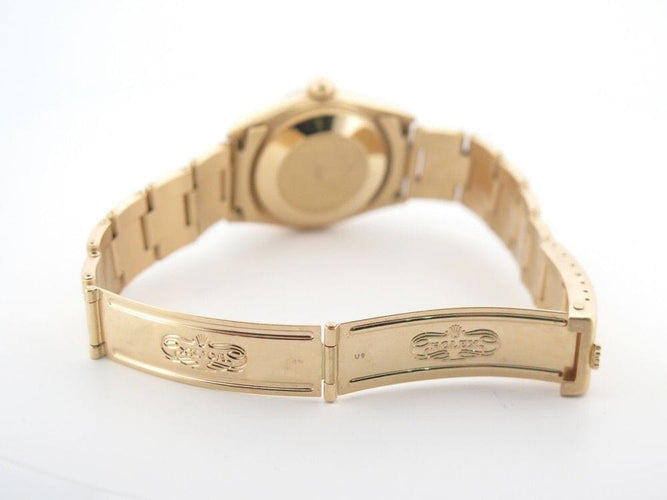 Montre vintage montre ROLEX oyster perpetual 67488 31 mm automatique or jaune 18k 58 Facettes 252911