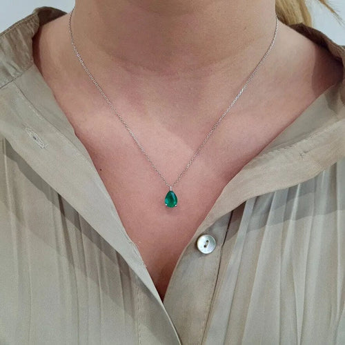 Collier Collier solitaire en or blanc, émeraude 58 Facettes