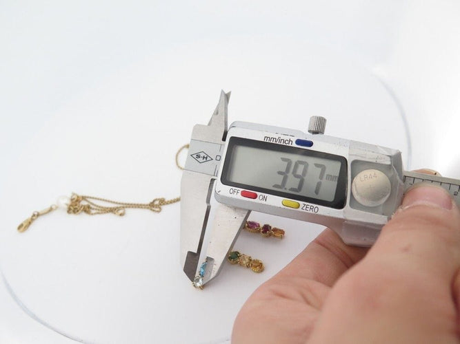 Collier collier pendentif DOLCE & GABBANA breloque f rainbow t50 or jaune 58 Facettes 250337