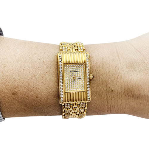 Montre Montre Boucheron "Reflet" or jaune et diamants. 58 Facettes 30779
