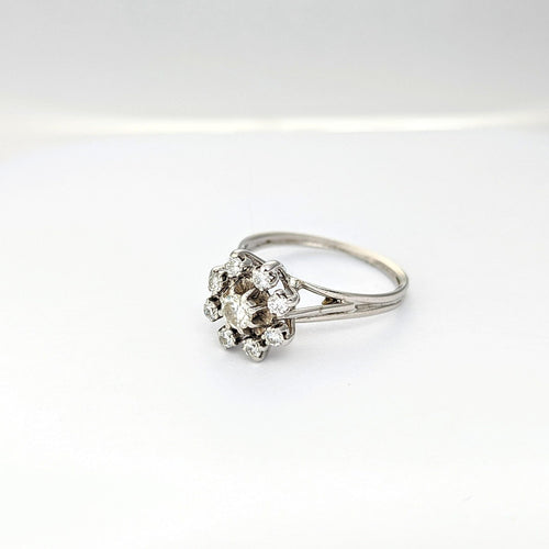 Bague Bague Marguerite en or blanc et diamants 58 Facettes 21248