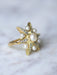 Bague étoile ancienne en or jaune, diamants, et perles fines 58 Facettes