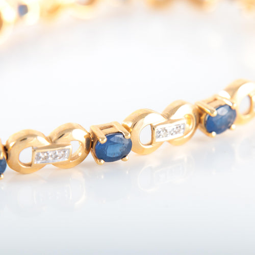 Bracelet BRACELET OR JAUNE 18K SAPHIRS ET DIAMANTS 58 Facettes LP 2142