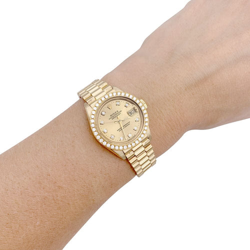 Montre Montre Rolex,"Oyster Pertpetual Datejust", or jaune, diamants. 58 Facettes 33072