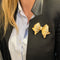 Broche Broche Repossi "noeud" en ors jaune et blanc, diamants. 58 Facettes 31272