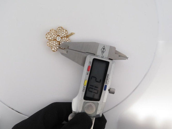 Broche vintage broche VAN CLEEF & ARPELS cosmos or jaune 18k diamants 3.65ct 58 Facettes 250924