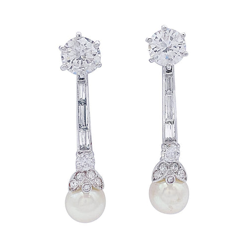 Boucles d'oreilles Boucles d'oreilles pendantes or blanc, platine, perles et diamants. 58 Facettes 32434