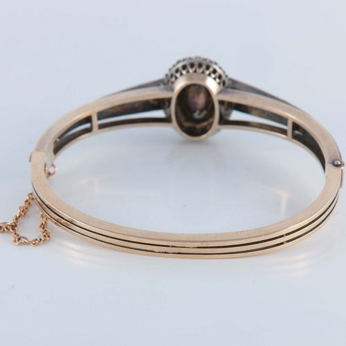 Bracelet Bracelet avec un grenat cabochon, or et argent 58 Facettes