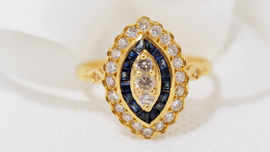 Bague Bague marquise or jaune saphirs calibrés et diamants 58 Facettes 30778