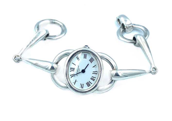 Montre CHOPARD. Montre vintage argent et mouvement mécanique 58 Facettes