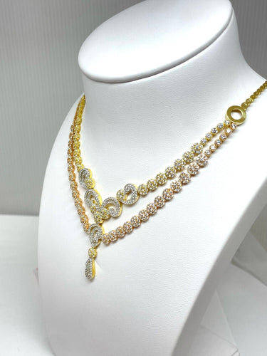 Collier Parure en or jaune, rose et blanc oxydes de zirconium 58 Facettes