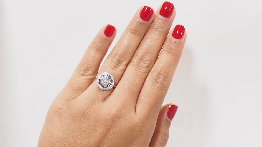 Bague Bague double entourage Art Déco platine, saphirs calibrés et diamants 58 Facettes