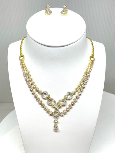 Collier Parure en or jaune, rose et blanc oxydes de zirconium 58 Facettes