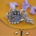 Broche Broche bouquet saphirs diamants 58 Facettes 19-564