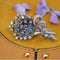Broche Broche bouquet saphirs diamants 58 Facettes 19-564