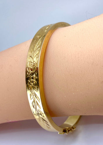 Bracelet Bracelet jonc ouvrant ciselé de roses et de feuilles 58 Facettes