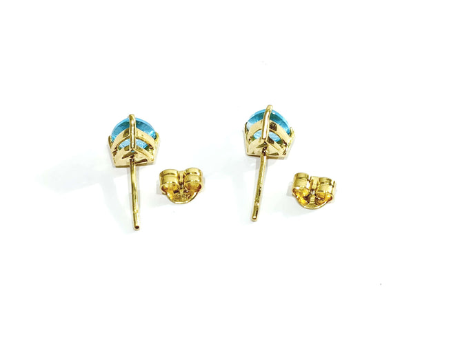 Boucles d'oreilles Paire de boucles d'oreilles or et topaze bleue 58 Facettes