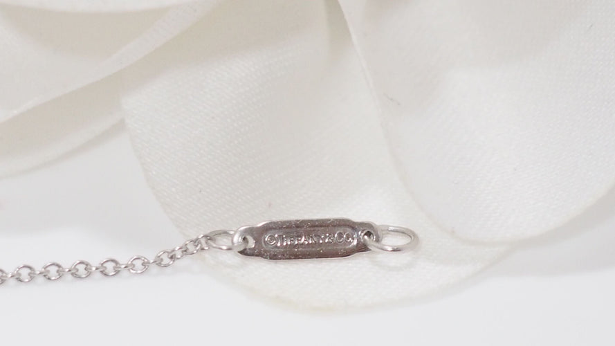 Bracelet Tiffany & Co - Bracelet Noeud  en platine et diamants 58 Facettes 32159