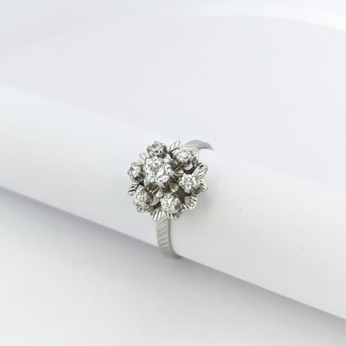 Bague Bague marguerite en or blanc et diamants 58 Facettes 25485