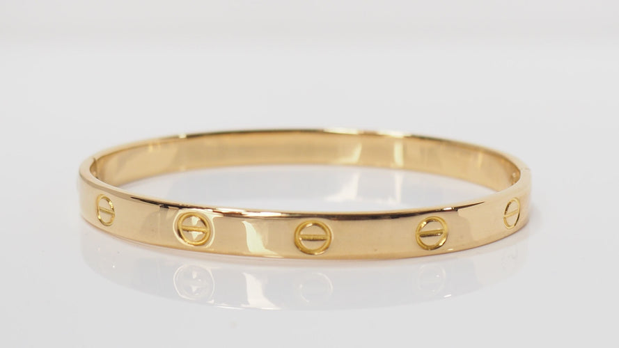 Bracelet 18 Bracelet Cartier Love "vintage" en or jaune 58 Facettes 32199