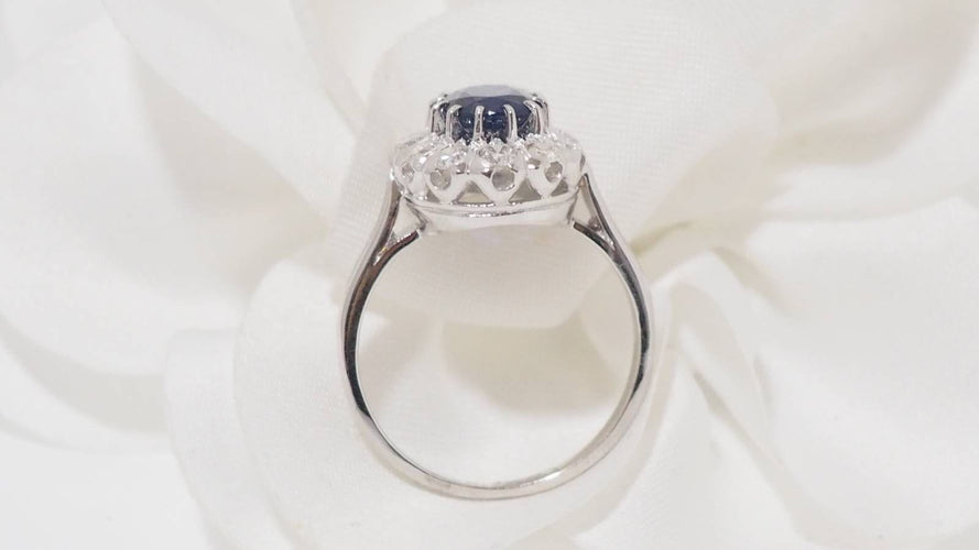 Bague 52 Bague marguerite en or blanc, saphir et diamants 58 Facettes 31169