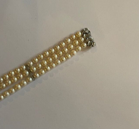 Bracelet Bracelet manchette perles blanches 58 Facettes