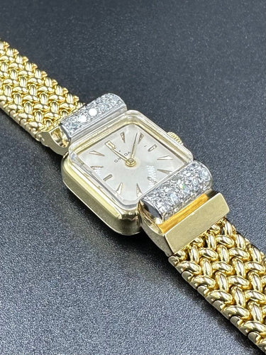 Montre OMEGA - Montre vintage 1950, or et diamants 58 Facettes