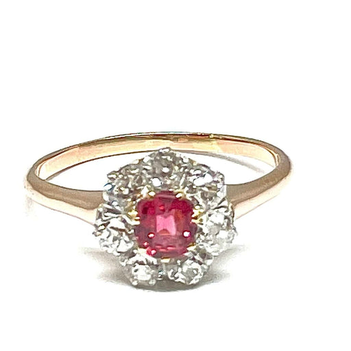 Bague Bague marguerite en or rose, rubis et diamants 58 Facettes