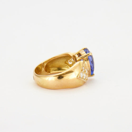 Bague 54 Bague en Or jaune, diamants, tanzanite 58 Facettes