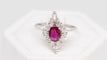 Bague Bague marquise en or blanc, rubis et diamants navette 58 Facettes 29917