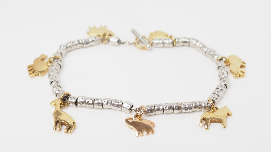 Bracelet 19cm Bracelet breloques Dodo en or jaune et argent 58 Facettes 25557