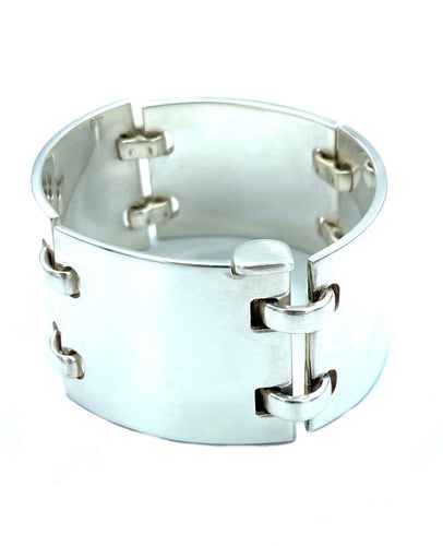 Bracelet HERMÈS. Bracelet manchette articulée argent 58 Facettes