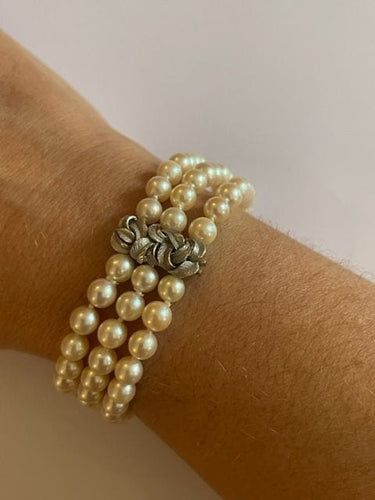 Bracelet Bracelet manchette perles blanches 58 Facettes