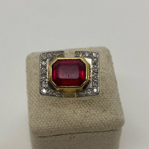 Bague Bague Tank or jaune, pierre rouge 58 Facettes 20400000495